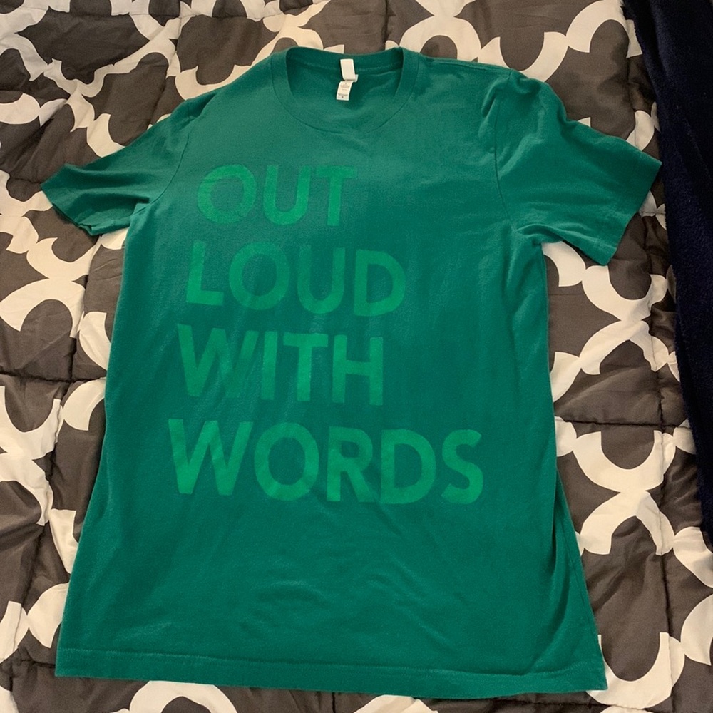 A medium size tee. Is green with light green words.